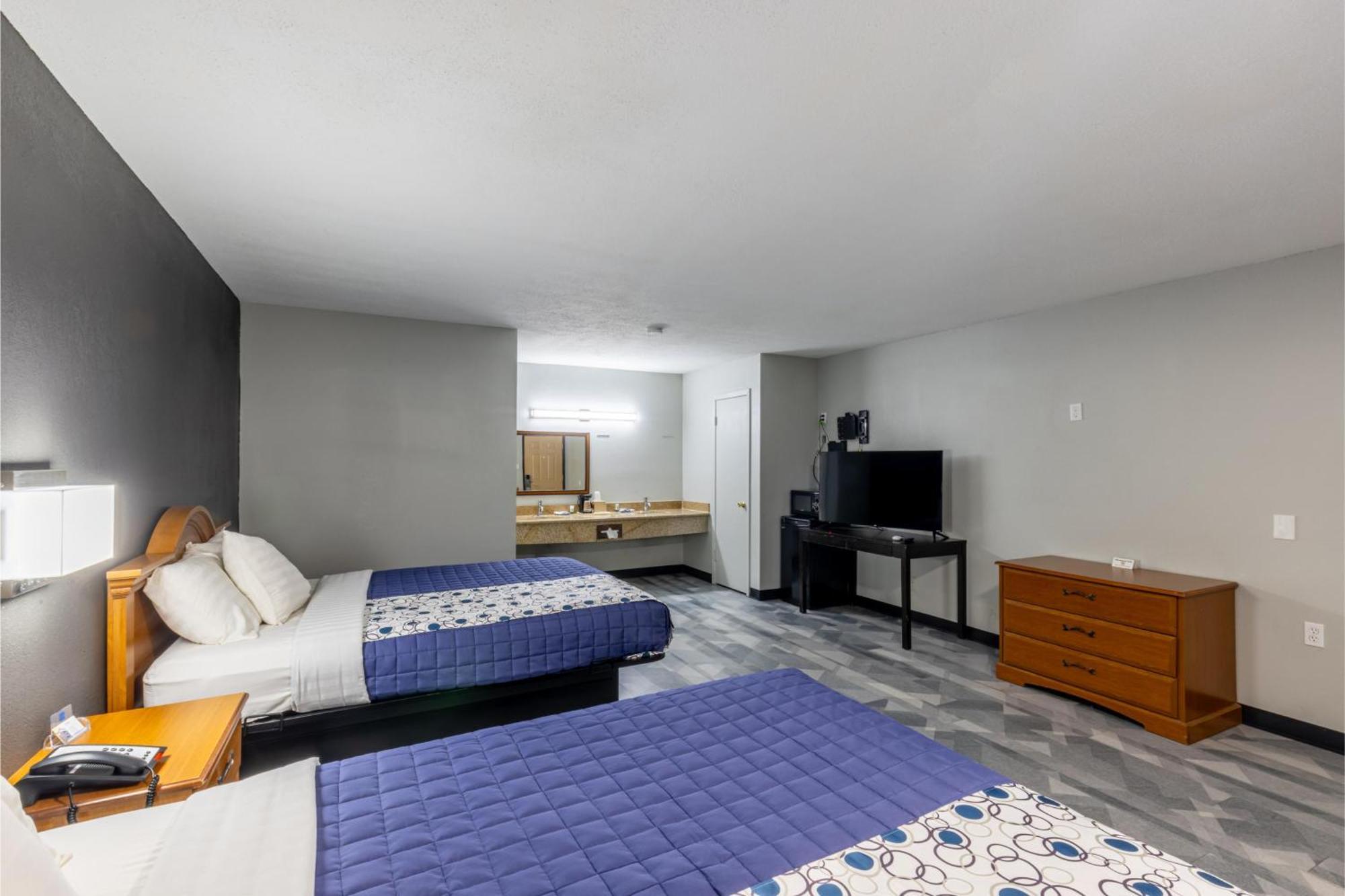 Freer Executive Inn And Studios Экстерьер фото