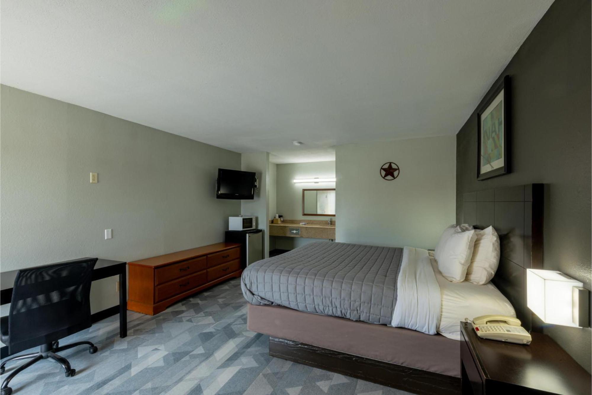 Freer Executive Inn And Studios Экстерьер фото